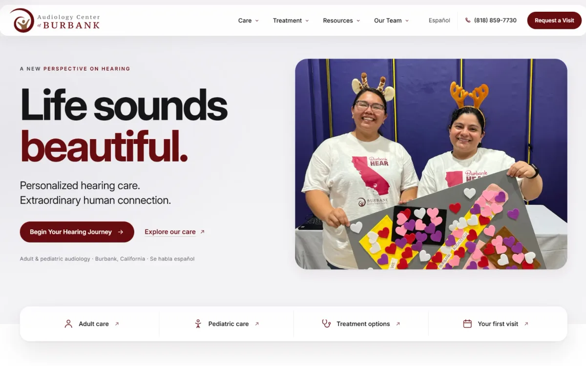 Audiology Center of Burbank homepage with the headline “Life sounds beautiful,” a Request a Visit button and links to adult care, pediatric care and first-visit information